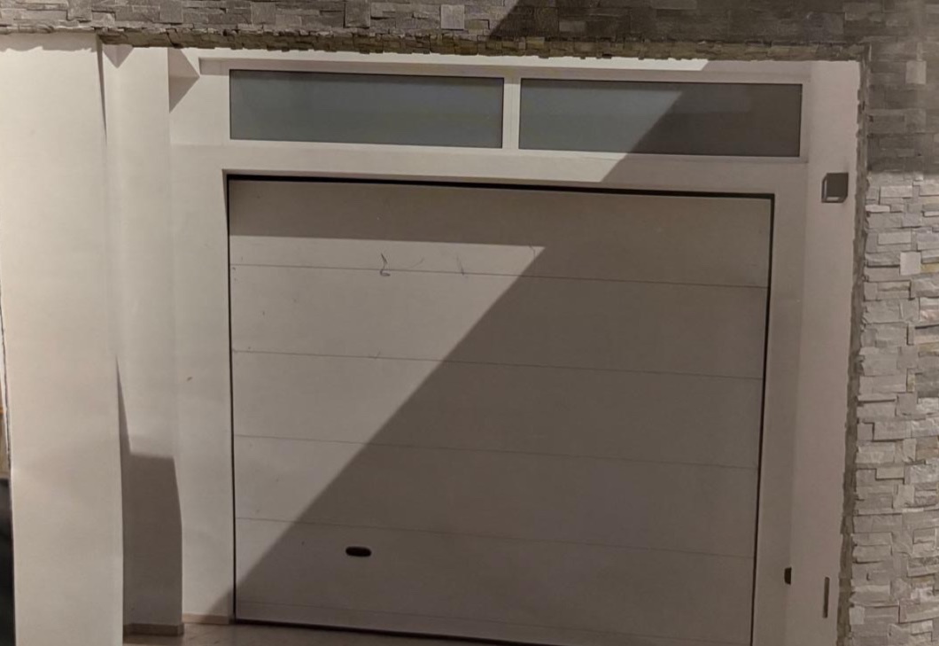 Depliant porta sezionale residenziale per garage